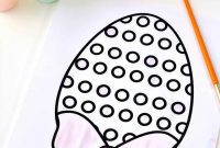 Coloring Easter Eggs with DIY Skittles Paint and Free Printables