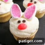 Fluffy Marshmallow Bunny Cupcakes 10 Decorated bunny cupcakes with marshmallow ears and jelly bean nose.