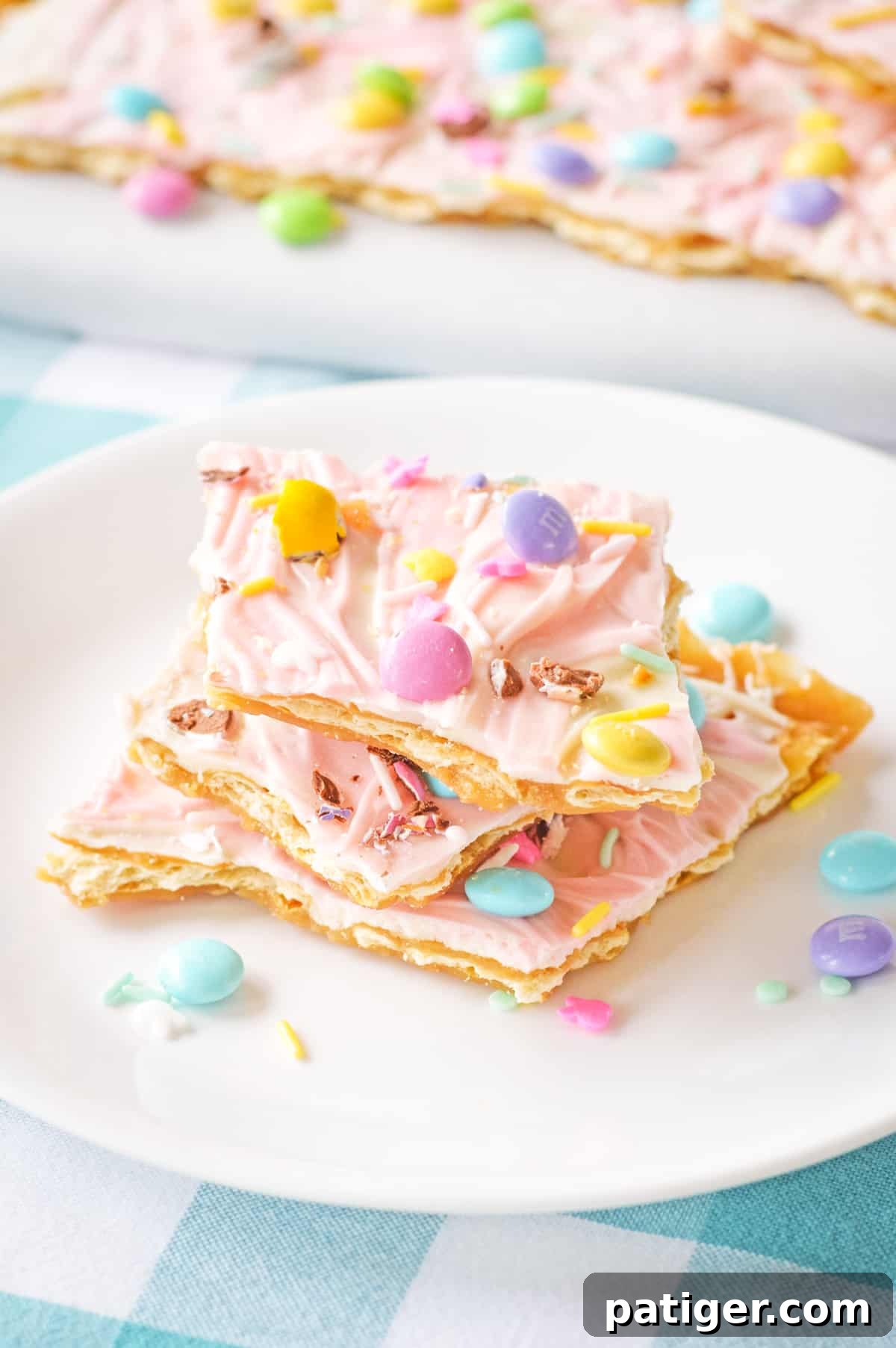 Easter bark (aka saltine toffee) with pink chocolate and pastel candies.
