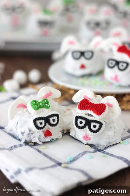 Easter Bunny Brownie truffles mad by coating brownie truffles with shredded coconut and decorating them with candy ears, bows, and glasses.