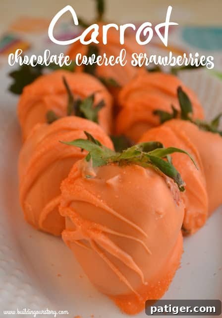 Orange chocolate covered Strawberries that resemble carrots for Easter.