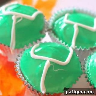 Easy game day cupcakes decorated with green icing and white goalposts