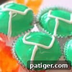 Easy game day cupcakes decorated with green icing and white goalposts