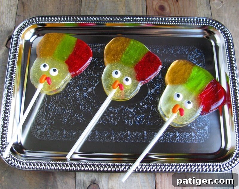 Three turkey lollipops on serving tray.