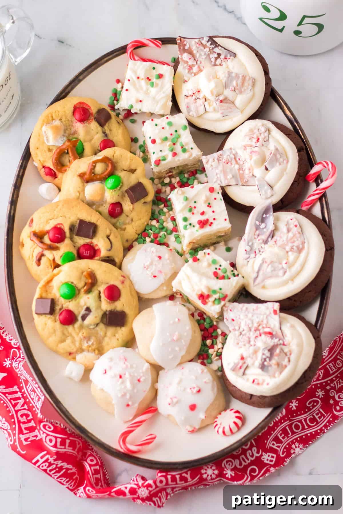 A festive platter showcasing a variety of Christmas cookie exchange cookies, including vibrant peppermint bark cookies, elegantly frosted sugar cookies, uniquely textured Christmas kitchen sink cookies, and delicate peppermint meltaways.