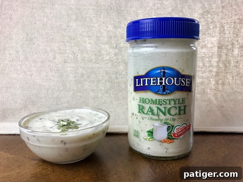 A crisp, vibrant image of a Litehouse Homestyle Ranch Dressing jar, emphasizing its fresh, high-quality appearance and role as the perfect, flavorful base for delicious homemade dips.