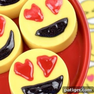 A finished Heart Eyes Emoji Valentine Oreos cookie.