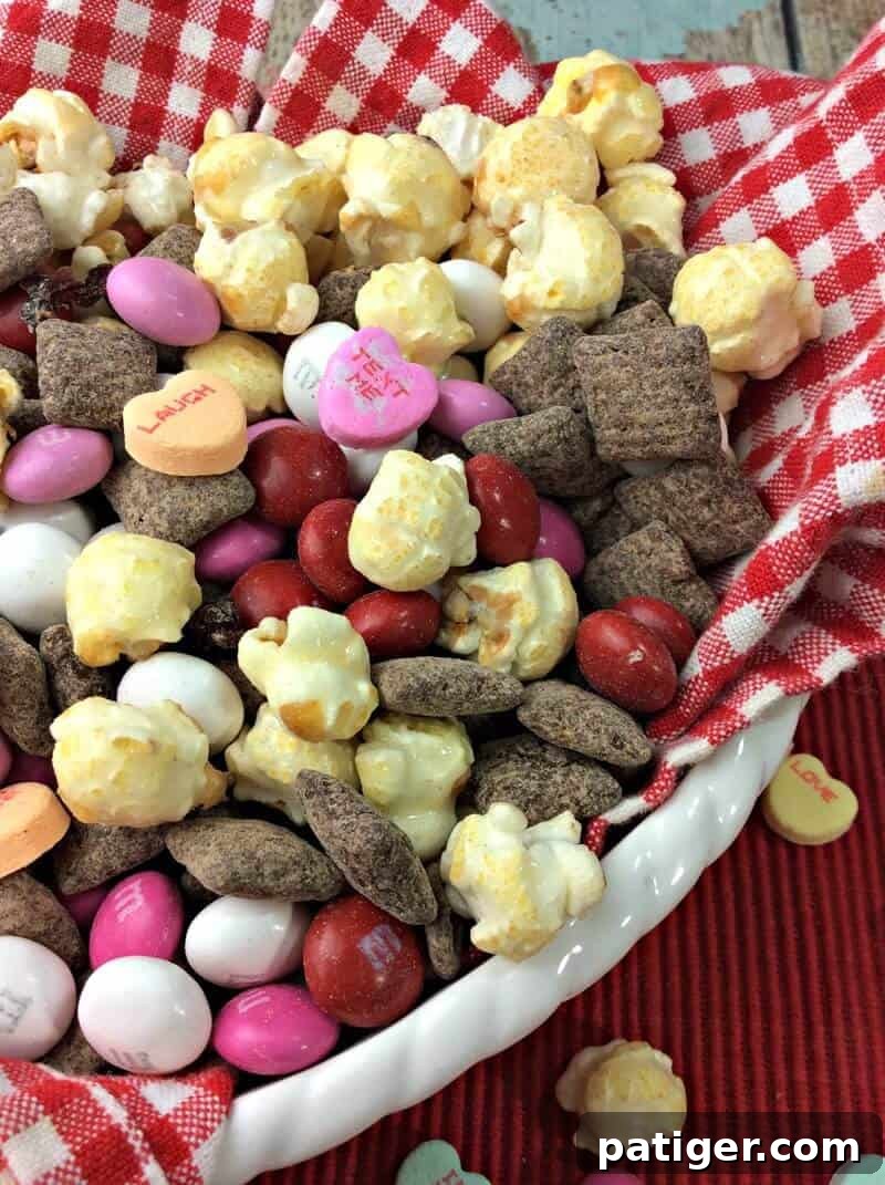 Sweet Valentine Medley 4 Close up of the cherry muddy buddy snack mix.