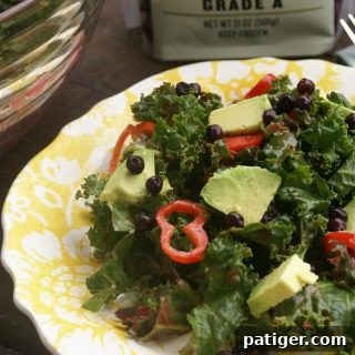 Delicious Kale Blueberry Salad with Raspberry Lime Vinaigrette