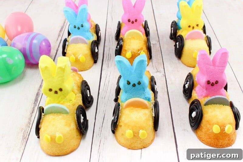 Marshmallow Peeps in Twinkies decorated with candies to look like cars.