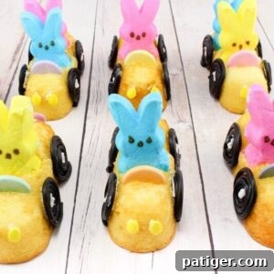 Peeps Twinkie Cars with Necco wafer steering wheels and licorice tires.