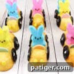 Peeps Twinkie Cars with Necco wafer steering wheels and licorice tires.