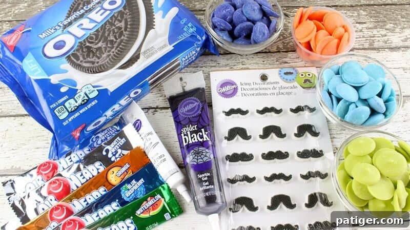 Father's Day Dipped Oreo Delights 3 A colorful array of ingredients for making Father's Day Mustache and Tie Chocolate Covered Oreos, including Oreos, candy melts, icing, and Airheads.