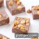 Easy chocolate peanut butter fudge cut in squares.