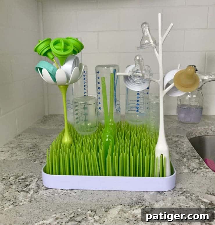 Your 11-Item Bottle Feeding Survival Kit 6 Bottle Drying Rack filled with bottles, nipples, etc...