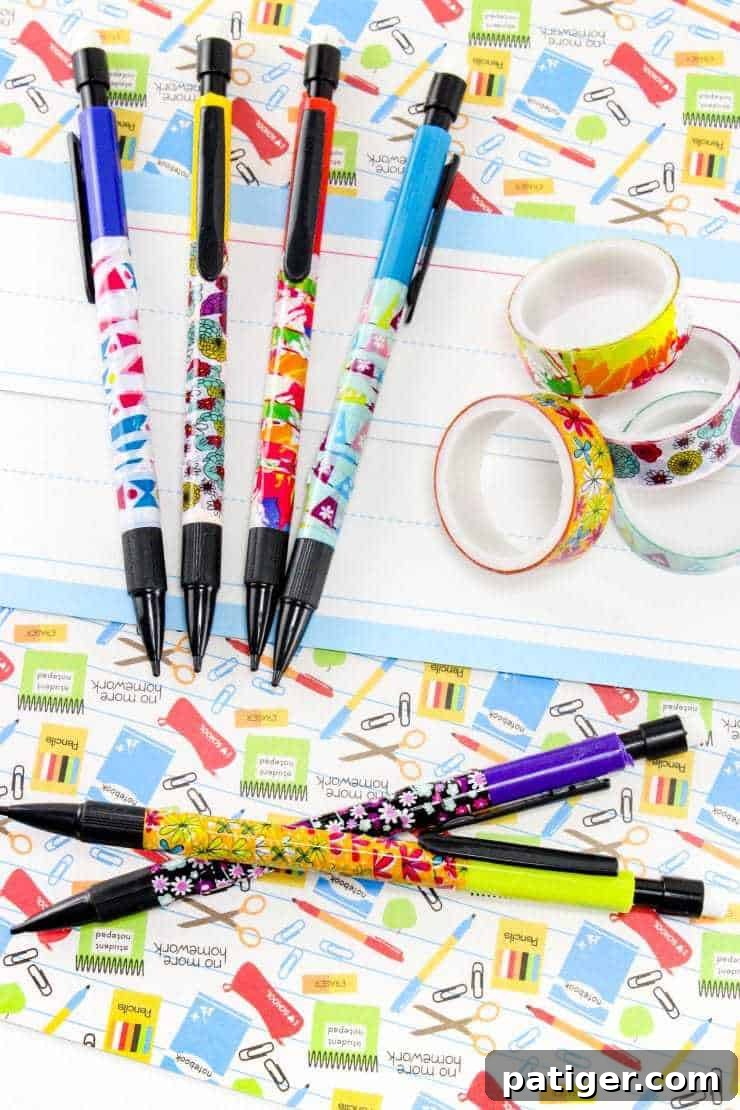 Personalize Your Pencils with Washi Tape for School 3 A collection of six mechanical pencils neatly wrapped in diverse, colorful washi tape patterns, alongside four rolls of matching patterned washi tape, highlighting the customization possibilities.