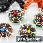 Make Halloween spiderweb cupcakes with chocolate spiders for Halloween! Just follow this easy recipe tutorial. 