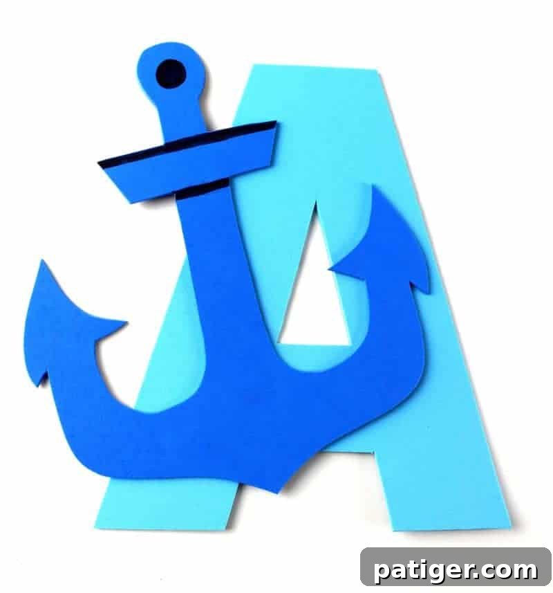 A is for Anchor: Printable Letter A Craft Fun 11 Completed Letter A for Anchor craft with a printable template, showing a yellow letter A with a blue anchor detailed with black marker. Perfect for preschool learning.