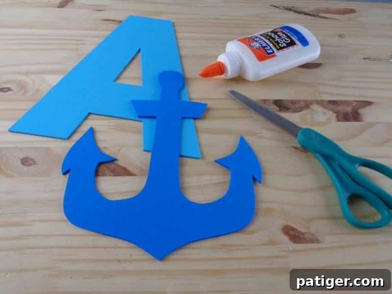 A is for Anchor: Printable Letter A Craft Fun 8 A child cutting out the traced anchor shape from dark blue craft foam, a fine motor skill exercise for the A is for Anchor craft.