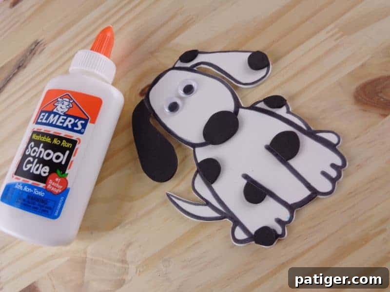 Fun Letter D Dog Craft Printable 11 Step 10: Glue on googly eyes to bring the Letter D dog craft to life.