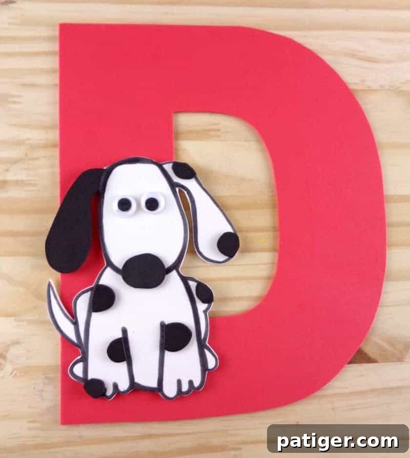 Fun Letter D Dog Craft Printable 12 Step 11: Glue the completed dog onto the large craft foam letter D, finalizing the alphabet craft.