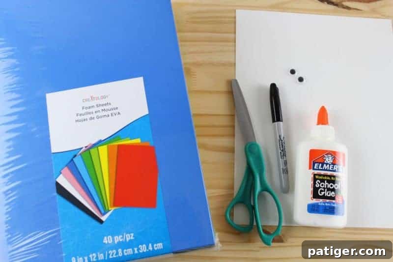 Fun Letter D Dog Craft Printable 3 Craft supplies laid out for a letter of the week project, designed to foster letter recognition in toddlers and preschoolers.