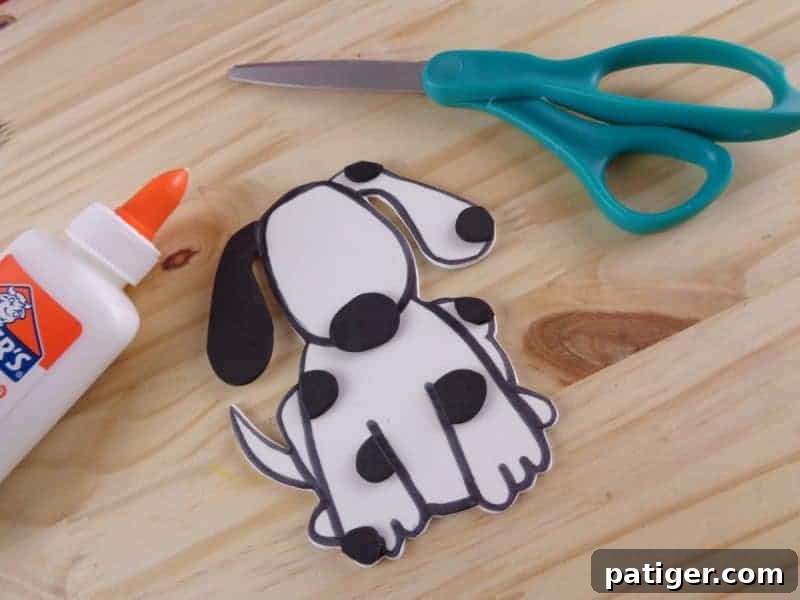 Fun Letter D Dog Craft Printable 10 Step 9: Trim off any excess material from the dog's features for a clean finish.