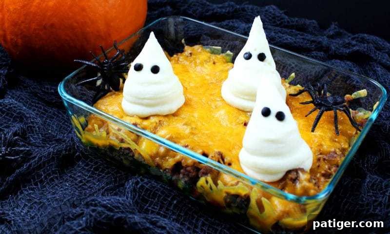 Graveyard Shepherd's Pie 4 Halloween dinner casserole topped with mashed potato ghosts.