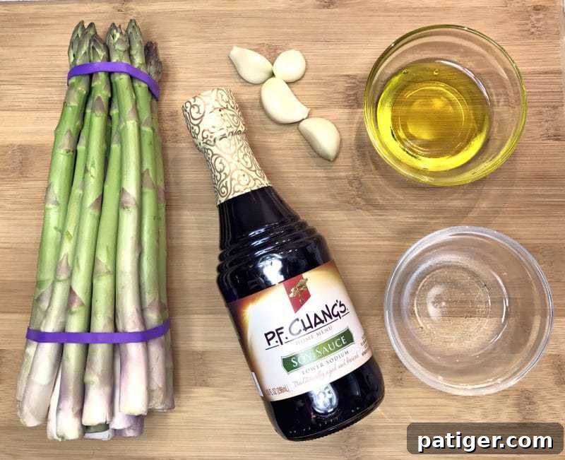 Garlic Soy Seared Asparagus 4 Bundle of asparagus, bottle of soy sauce, olive oil, fresh garlic cloves, water.