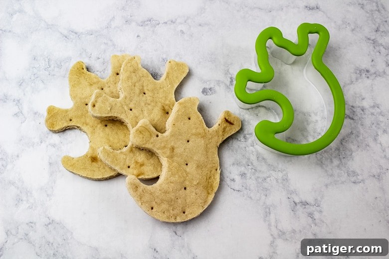 Phantom Pizza Bites 4 Ghost cookie cutter and three ghost-shaped pizza crusts.