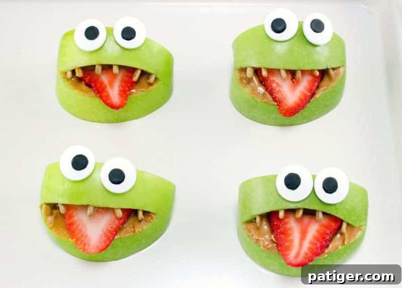 Green apple monster snacks after being completed.