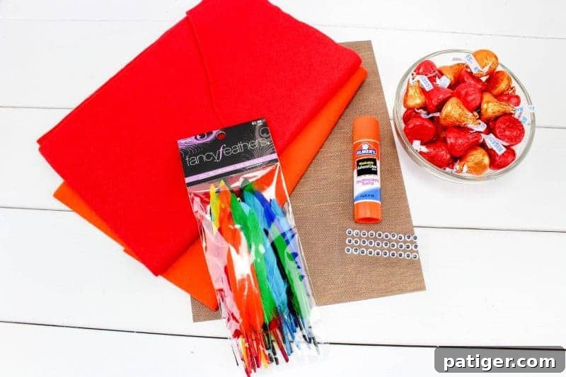 DIY Thanksgiving Chocolate Kiss Turkeys 5 Supplies for turkey crafts including felt, feathers, glue, googly eyes, and Hershey’s Kisses.