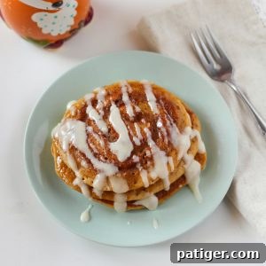 Cinnamon Swirl Pumpkin Spice Pancakes with Cream Cheese Glaze