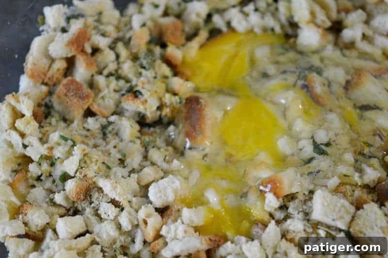 Mixing bowl with stuffing, eggs, and water for turkey and stuffing balls.