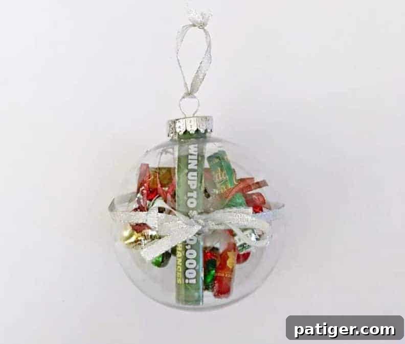 Winning Ticket Christmas Bauble 7 This Christmas Lottery Ticket Ornament is a fun and easy DIY gift idea perfect for teachers, neighbors, and anyone over 18 on your holiday shopping list!