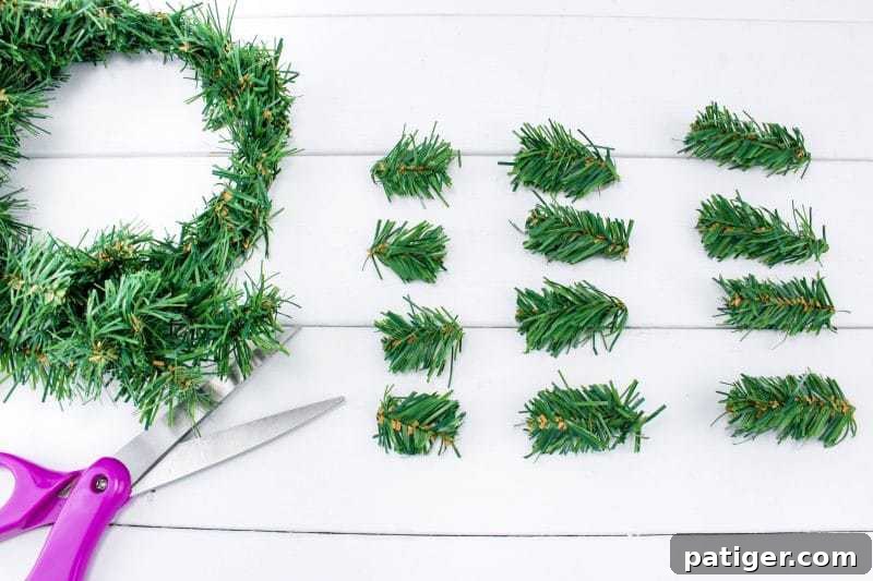 First step of the DIY ornament craft: cutting garland pieces into specified lengths.