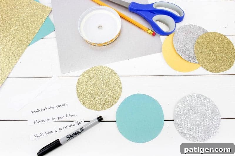 First step in making paper fortune cookies: tracing and cutting circles, then preparing fortune strips.