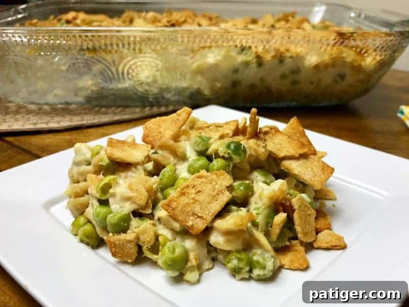 Guilt-Free Tuna Pasta Bake 5 A generous serving of the lightened-up tuna pasta casserole, ready to be enjoyed, highlighting the creamy sauce and tender ingredients.