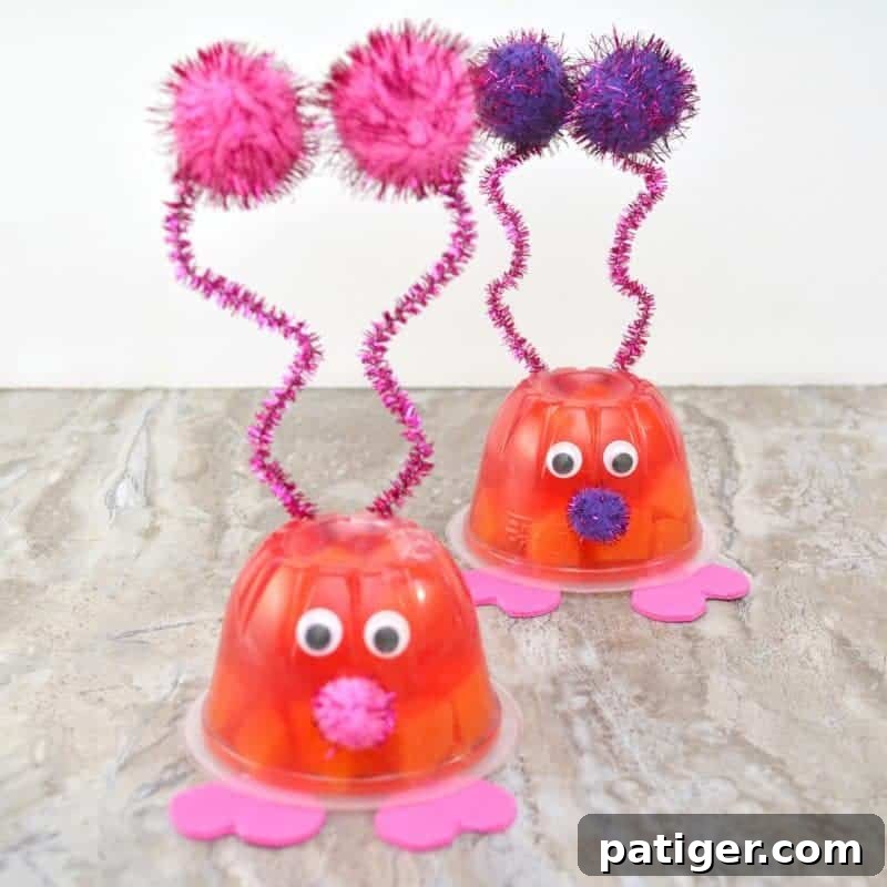 Fruity Love Bug Valentine Treats 2 Love Bug Valentine Fruit Cups displayed on a rustic wooden surface, perfect for kids' parties.