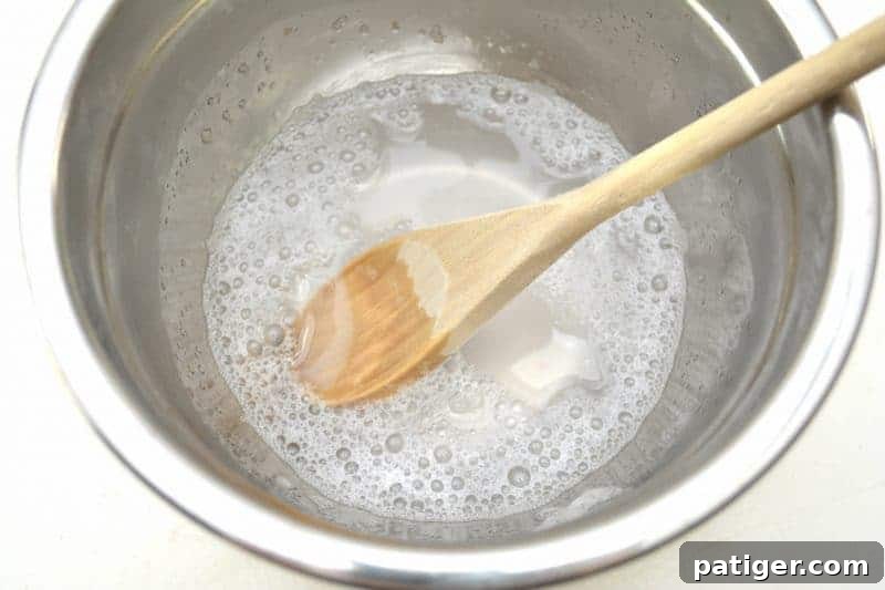 Sweetheart Slime Creation and Complimentary Gift Tags 5 Dissolving Borax in warm water in a separate bowl for slime activation
