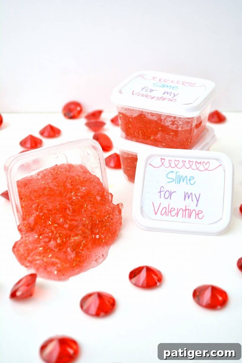Sweetheart Slime Creation and Complimentary Gift Tags 10 Finished Valentine slime gifts with labels and ribbons