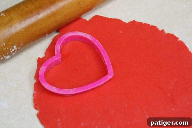 Step-by-step image of rolling out cookie dough