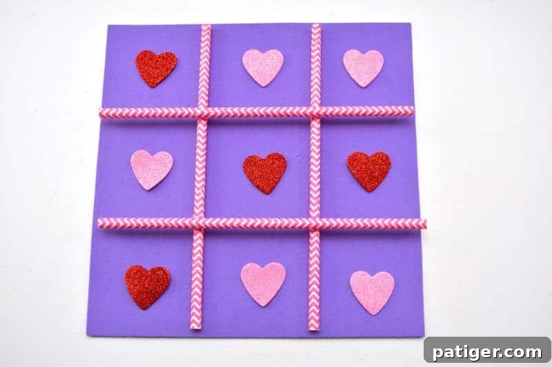 XOXO Tic Tac Toe 8 Pink and red heart-shaped game pieces for the Valentine's Tic Tac Toe board