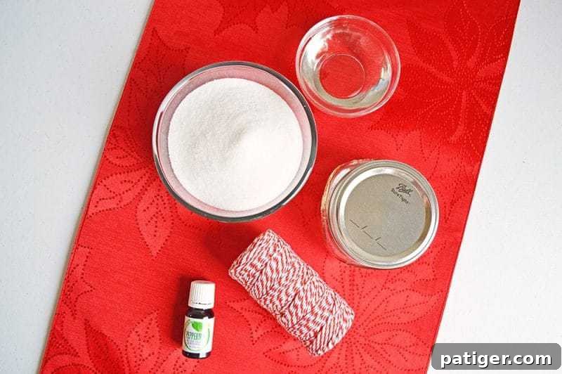 All the simple ingredients needed to make a quick and easy peppermint sugar scrub at home: coconut oil, white sugar, and peppermint essential oil.