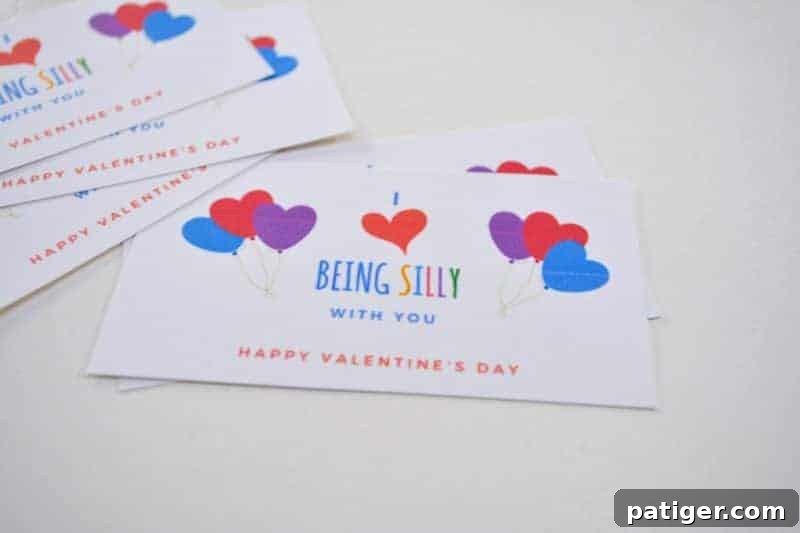 Step-by-step image showing how to cut out the Valentine printables