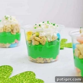 Finished St. Patrick’s Day Pudding Parfaits in clear glasses