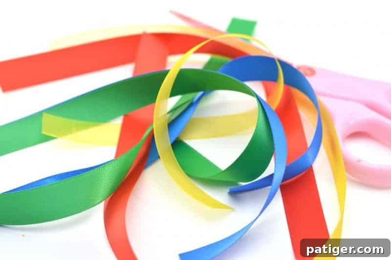 Measuring and cutting colorful ribbons for rainbow streamers