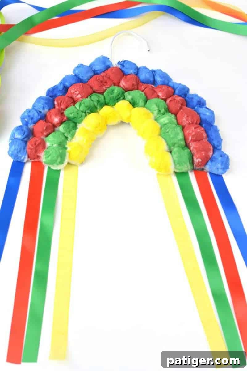 Another view of the completed hanging cotton ball rainbow craft
