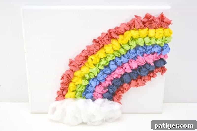 Rainbow Tissue Paper Magic 11 Final view of the completed rainbow tissue paper canvas craft for kids, showcasing detailed texture and bright colors.