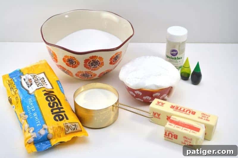 Shamrock Green Fudge 4 Ingredients laid out for St. Patrick's Day Green Fudge, including butter, sugar, half and half, vanilla, marshmallow fluff, white chocolate chips, and green food coloring.